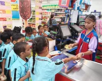 Mount View Students learning queue manners after an exciting purchase at the Mart Visit